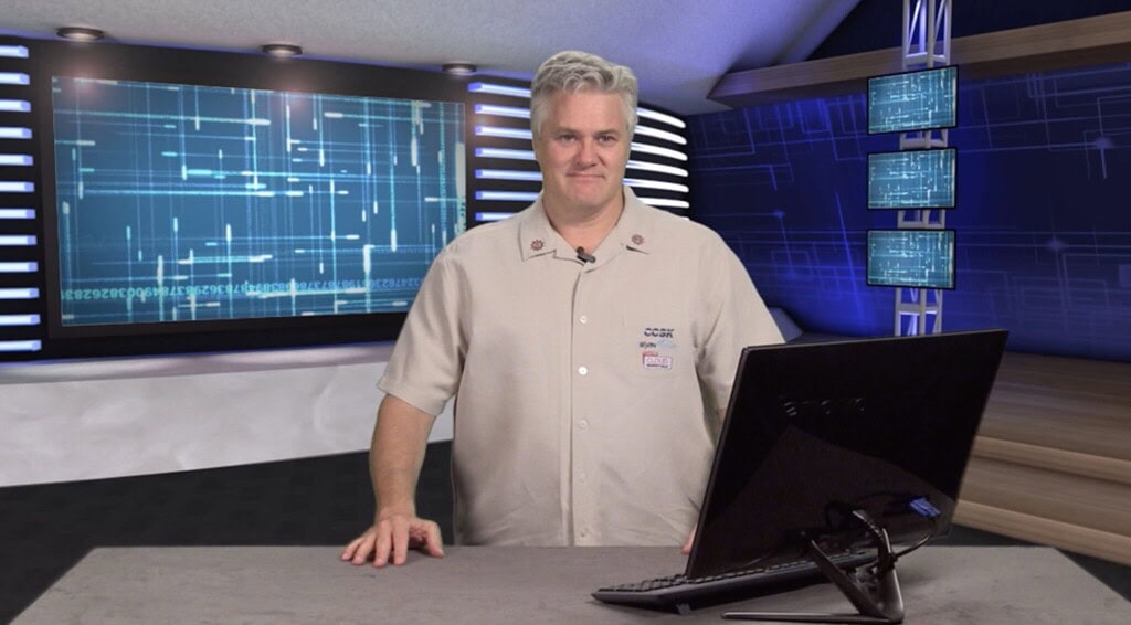 AIIT expert demonstrating advanced control room technology and digital interfaces.