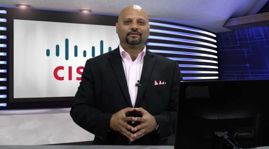 AIIT presenter at a professional event in a modern studio setting.